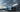 FORTHING M4 LED daytime running lights illuminated on a parked SUV under daylight